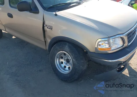 2000 Ford F150 from USA, damaged, VIN 1FTRX18W7YNA73804